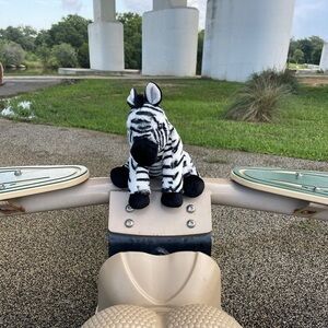 Wild Republic 12” black and white striped stuffed sitting zebra plush toy.